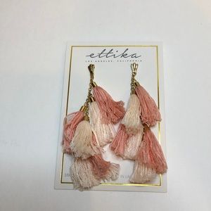 Ettika tassel earrings.